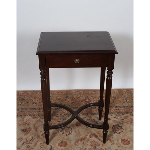 210 - A MAHOGANY OCCASIONAL TABLE of rectangular outline the shaped top with frieze drawer on reeded taper... 