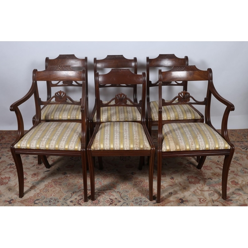 212 - A SET OF SIX REGENCY DESIGN MAHOGANY DINING CHAIRS including a pair of elbow chairs each with a carv... 