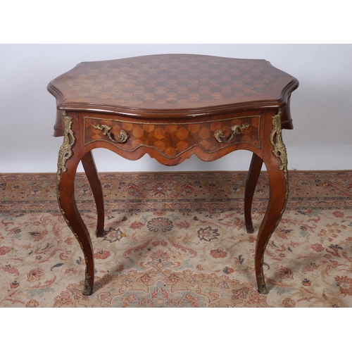 233 - A CONTINENTAL KINGWOOD PARQUETRY AND GILT BRASS MOUNTED OCCASIONAL TABLE of serpentine outline the s... 