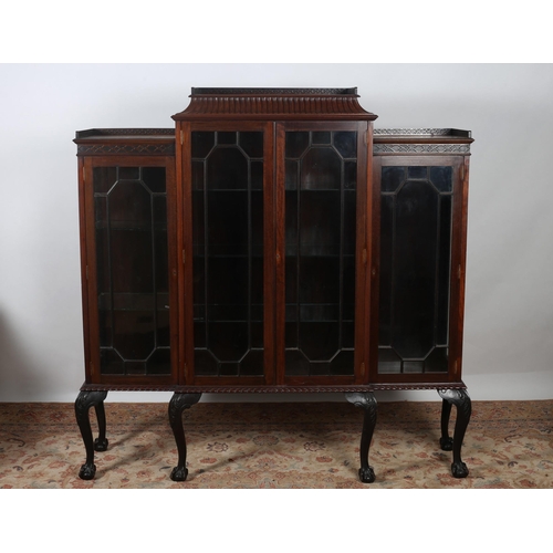 234 - A CHINESE CHIPPENDALE STYLE MAHOGANY CHINA DISPLAY CABINET the raised superstructure with moulded ga... 