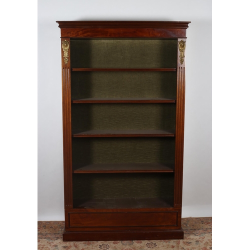 239 - A GEORGIAN DESIGN MAHOGANY OPEN FRONT BOOKCASE the architectural pediment above five open shelves be... 