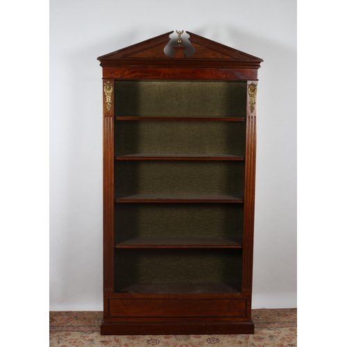 239 - A GEORGIAN DESIGN MAHOGANY OPEN FRONT BOOKCASE the architectural pediment above five open shelves be... 