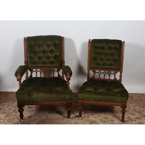 242 - A PAIR OF GOTHIC DESIGN MAHOGANY AND UPHOLSTERED LADIES AND GENTLEMANS CHAIRS each with a deep butto... 