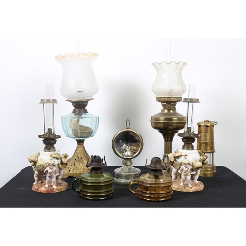 265 - A MISCELLANEOUS COLLECTION to include a pair of continental flower encrusted oil lamps, a copper and... 