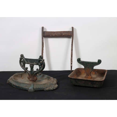 281 - THREE CAST IRON FOOT SCRAPES with scroll decoration together with a cast iron foot scrape, etc. (3)