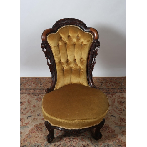 331 - A 19TH CENTURY CARVED MAHOGANY UPHOLSTERED LADY'S CHAIR the shaped top rail with buttoned upholstere... 