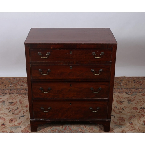 337 - A GEORGIAN DESIGN MAHOGANY CHEST of rectangular outline the shaped top above four long graduated dra... 