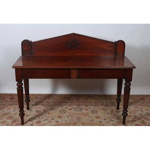 338 - A VICTORIAN MAHOGANY SIDE TABLE of rectangular outline the shaped top with moulded gallery above a m... 