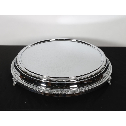 356 - A SILVER PLATED CAKE STAND the circular dish top with beadwork decoration on scroll legs 56cm(d)