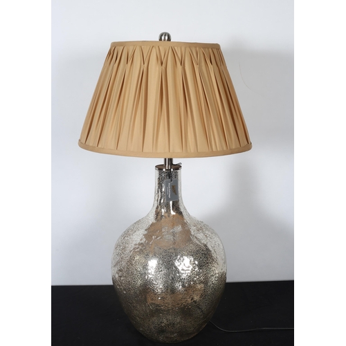 357 - A LUSTRE WARE TABLE LAMP of bulbous form with pleated shade 
83cm (h)