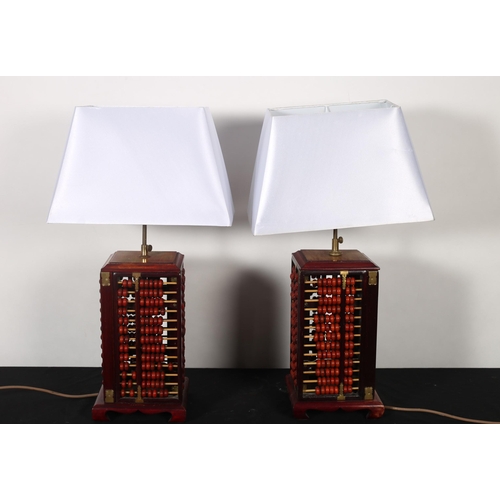 362 - A PAIR OF VINTAGE CHINESE ABACUS LAMPS each of square form with shades 70cm(h)