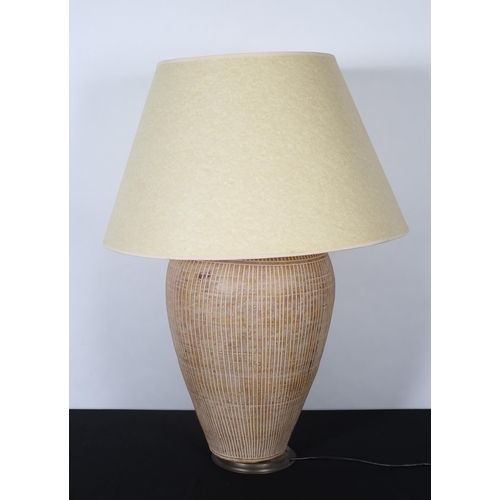 363 - A TERRACOTTA TABLE LAMP of ovoid tapering form with fluted decoration and shade
96cm (h)