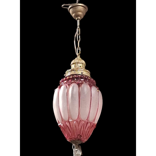 386 - A VINTAGE FROSTED GLASS RUBY GLASS AND GILT BRASS MOUNTED CENTRE LIGHT of ovoid tapering form with l... 