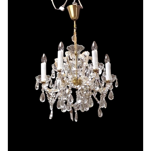 391 - A CONTINENTAL CUT GLASS SIX BRANCH CHANDELIER hung with faceted chains and pendent drops, Drop 70cm