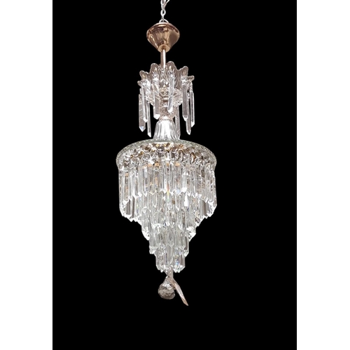 396 - A CONTINENTAL CUT GLASS CHANDELIER hung with cascading faceted pendants 
Drop 85cm