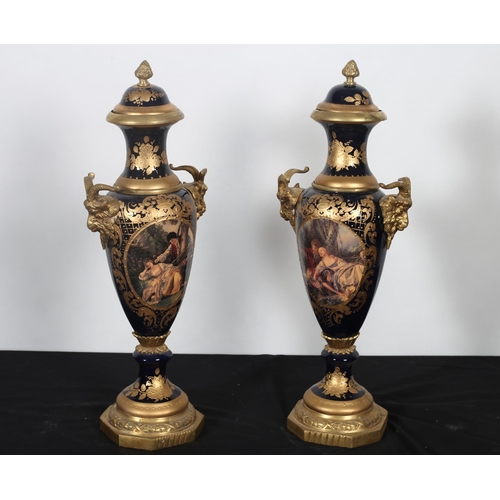 413 - A PAIR OF CONTINENTAL SEVRES GILT BRASS AND GILT LIDDED VASES each of ovoid tapering form decoration... 