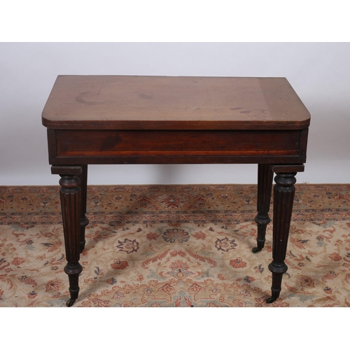 420 - A 19TH CENTURY MAHOGANY FOLDOVER SUPPER TABLE the rectangular hinged top above an inlaid frieze on l... 