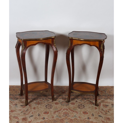 429 - A PAIR OF CONTINENTAL KINGWOOD MARQUETRY AND GILT BRASS MOUNTED TABLES each of serpentine outline th... 