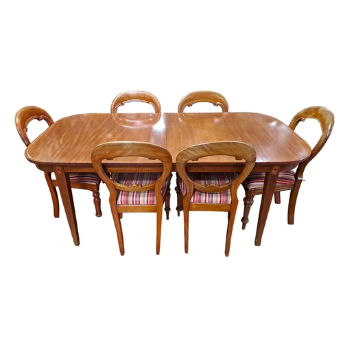 438 - A SEVEN PIECE MAHOGANY DINING ROOM SUITE comprising six 19th century dining chairs each with a curve... 