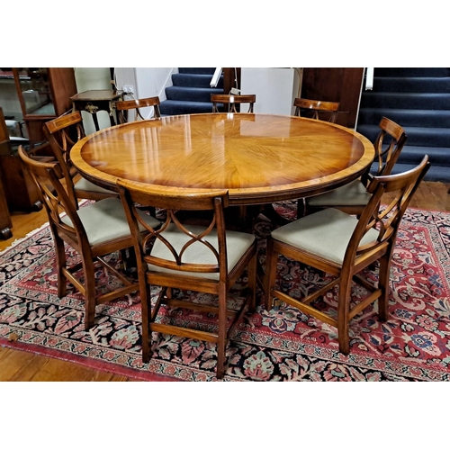 439 - AN ELEVEN PIECE SHERATON DESIGN MAHOGANY INLAID DINING ROOM SUITE comprising a crossbanded pod table... 