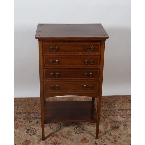 449 - AN EDWARDIAN MAHOGANY AND SATINWOOD INLAID MUSIC CABINET of rectangular outline the shaped top above... 