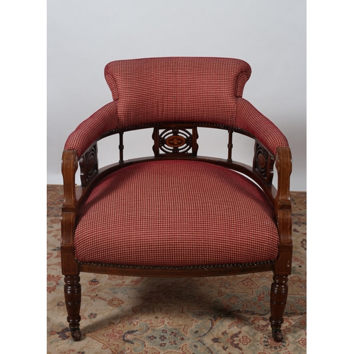 466 - AN EDWARDIAN MAHOGANY INLAID AND UPHOLSTERED TUB SHAPED CHAIR the shaped back with upholstered arm r... 