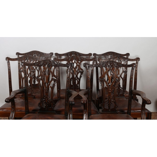 468 - A NINE PIECE MAHOGANY DINING ROOM SUITE comprising eight Chippendale style dining chairs, including ... 