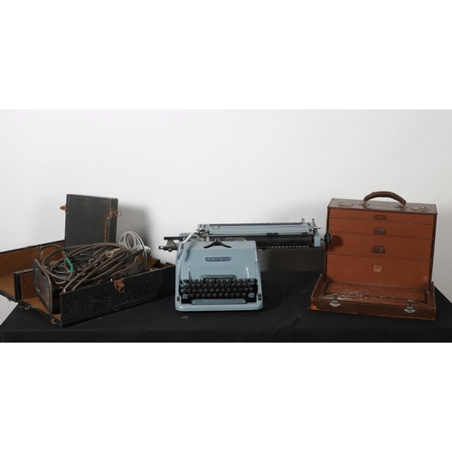 491 - A VINTAGE IMPERIAL TYPEWRITER, a vintage Stella folding screen, a vintage leather case containing fi... 