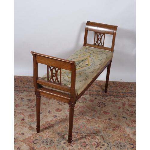 79 - A VINTAGE MAHOGANY AND NEEDLEWORK UPHOLSTERED STOOL of rectangular outline the shaped needlework loo... 