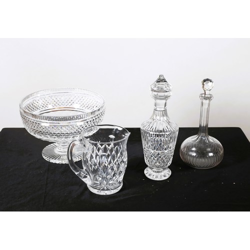 840 - A WATERFORD CUT GLASS DECANTER with stopper, a Waterford cut glass jug, a large hobnail cut bowl, a ... 