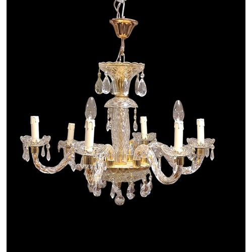 393 - A CONTINENTAL CUT GLASS SIX BRANCH CHANDELIER the baluster column issuing six spiral twists, scroll ... 