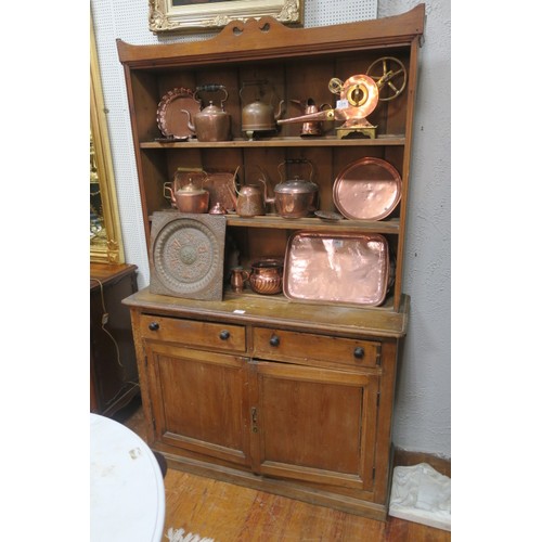 65 - A 19TH CENTURY PITCH PINE OPEN FRONT DRESSER the moulded cornice above three open shelves the base w... 