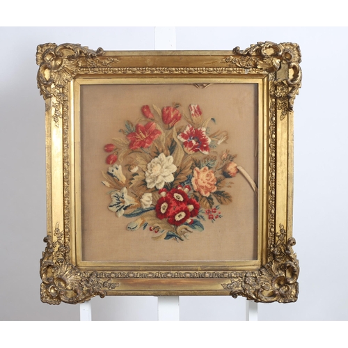 116 - A PAIR OF 19TH CENTURY NEEDLEWORK PANELS depicting floral studies in ornate gilt frames 
70cm (h) x ... 