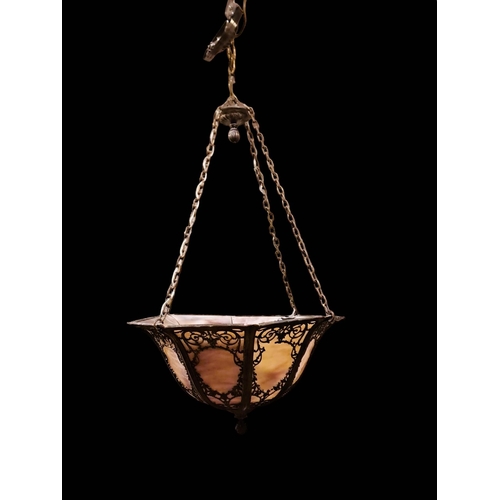 194 - AN ART DECO STYLE HANGING SHADE of octagonal tapering form decorated with stylised flowerheads and f... 