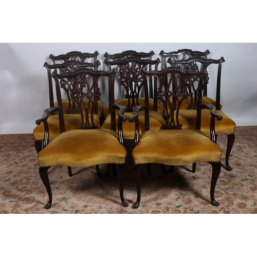 210 - A NINE PIECE MAHOGANY DINING ROOM SUITE comprising a set of eight Chippendale style dining chairs, i... 