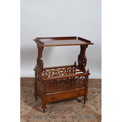 215 - A 19TH CENTURY BURR WALNUT CANTERBURY the rectangular top with moulded gallery raised on pierced fre... 