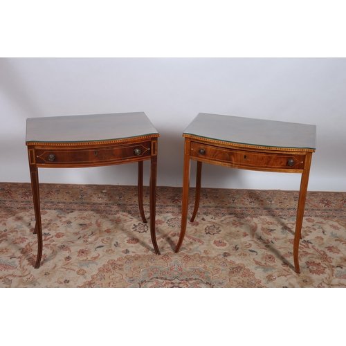 225 - A PAIR OF SHERATON STYLE MAHOGANY AND SATINWOOD INLAID SIDE TABLES each of rectangular bowed outline... 