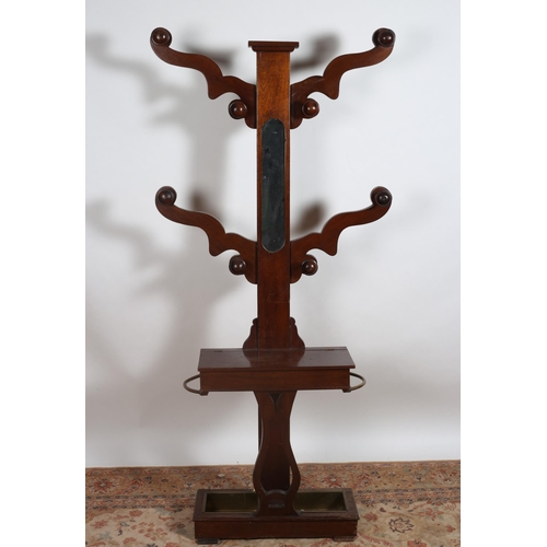 249 - A 19TH CENTURY MAHOGANY COAT TREE with hinged compartment flanked by stick compartments with detacha... 