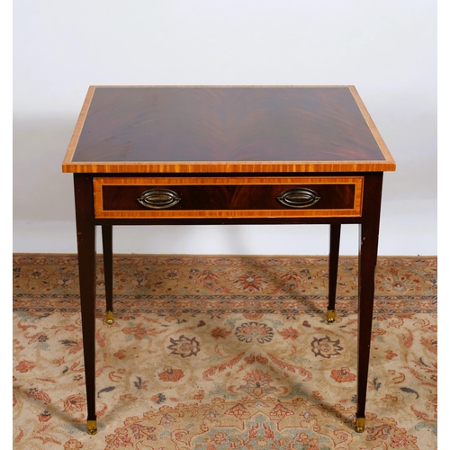 276 - A SHERATON DESIGN MAHOGANY AND SATINWOOD INLAID TABLE of rectangular outline the shaped top with fri... 