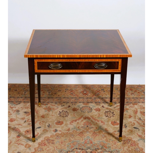 277 - A SHERATON DESIGN MAHOGANY AND SATINWOOD INLAID TABLE of rectangular outline the shaped top with fri... 