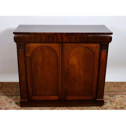 281 - A 19TH CENTURY MAHOGANY SIDE CABINET of rectangular outline the shaped top above a pair of rectangul... 