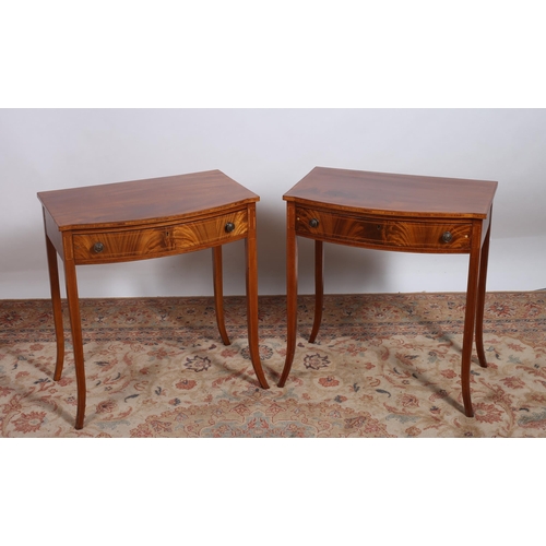 291 - A PAIR OF SHERATON STYLE MAHOGANY AND SATINWOOD INLAID SIDE TABLES each of rectangular bowed outline... 