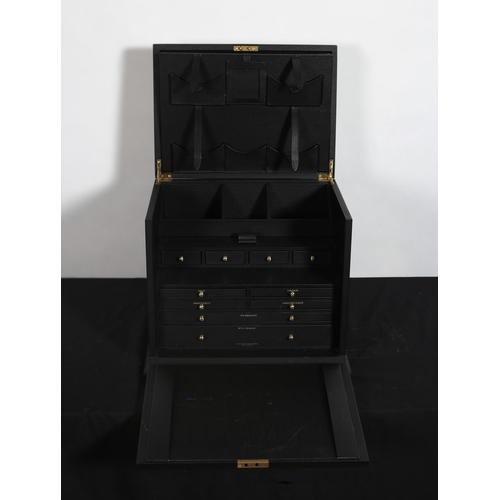 314 - A BLACK LEATHER BOUND STATIONERY CASE of rectangular outline the hinged lid containing compartments ... 