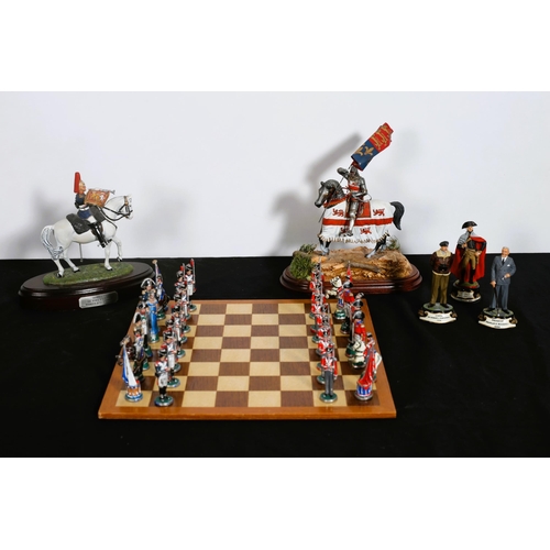 322 - A WHITE METAL AND POLYCHROME CHESS SET depicting a historical battle between England and Napoleon's ... 