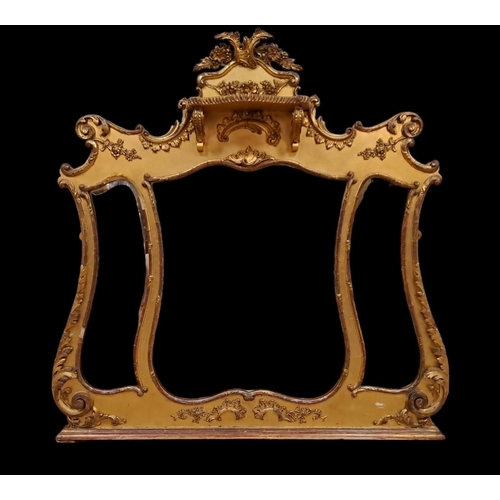 377 - A 19TH GILTWOOD AND GESSO COMPARTMENTED OVERMANTEL MIRROR the shaped plates within a foliate C-scrol... 