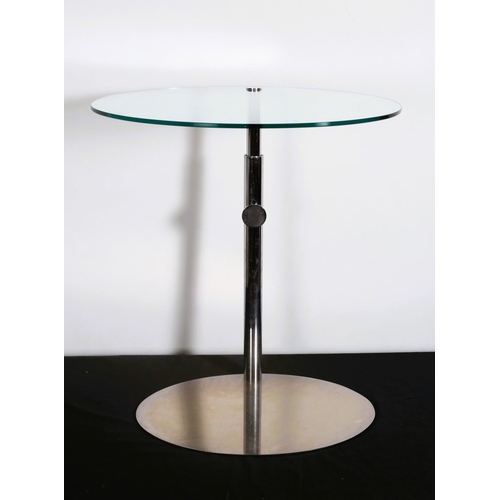 403 - A PORODA CHROME AND GLAZED SIDE TABLE the oval glazed top above an adjustable arm raised on an oval ... 