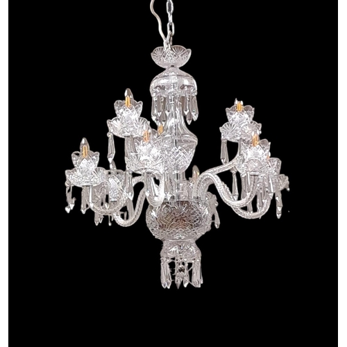 405 - A TARA CRYSTAL NINE BRANCH CHANDELIER with scroll arms and drip pans hung with faceted pendants 
70c... 