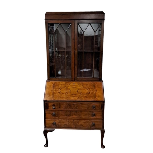 418 - A VINTAGE WALNUT BUREAU BOOKCASE the moulded cornice above a pair of astragal doors with adjustable ... 