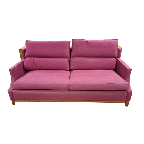 429 - A GOOD DORESTA SETTEE the rectangular upholstered frame with loose cushions and shaped arms on cherr... 