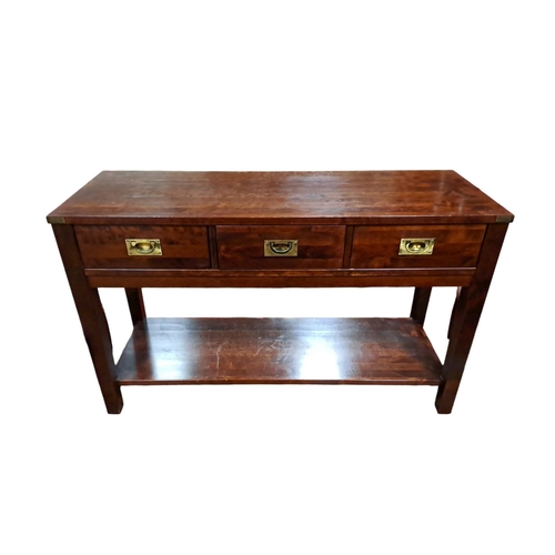 433 - A LAURA ASHLEY CHERRYWOOD CONSOLE TABLE of rectangular outline the shaped top with three frieze draw... 